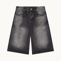 THE STILL WIDE-LEG DENIM SHORT — FADED BLACK — product view on warm ivory.