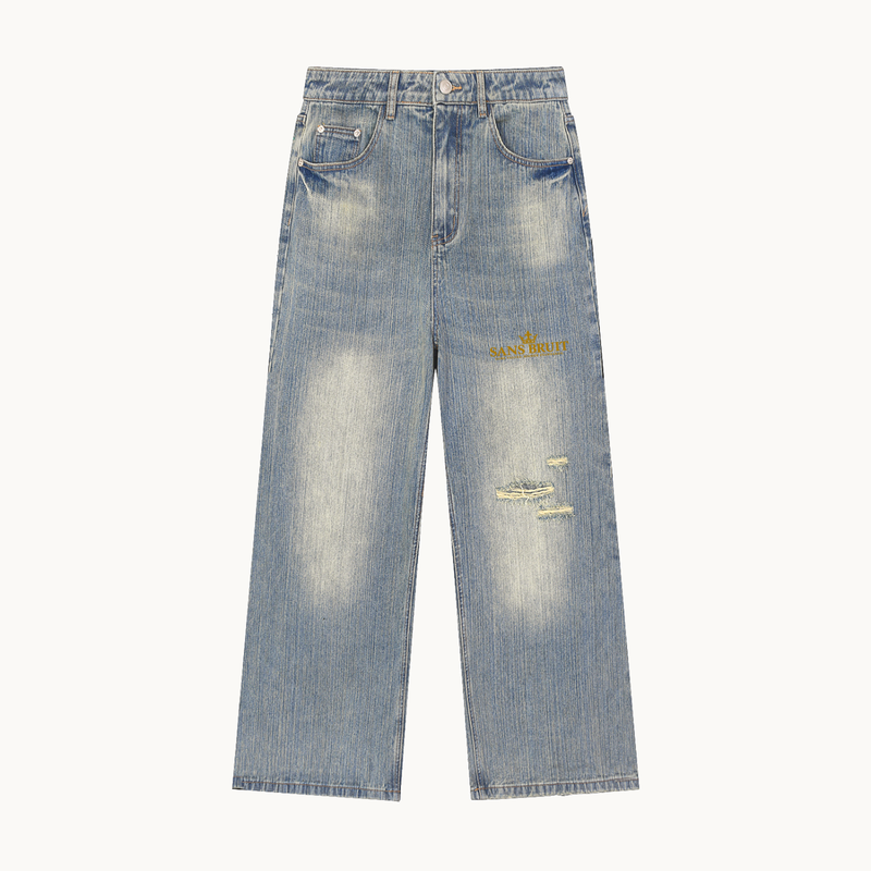 Sans Bruit Distressed Wide-Leg Jeans — Vintage Wash — product view on warm ivory.