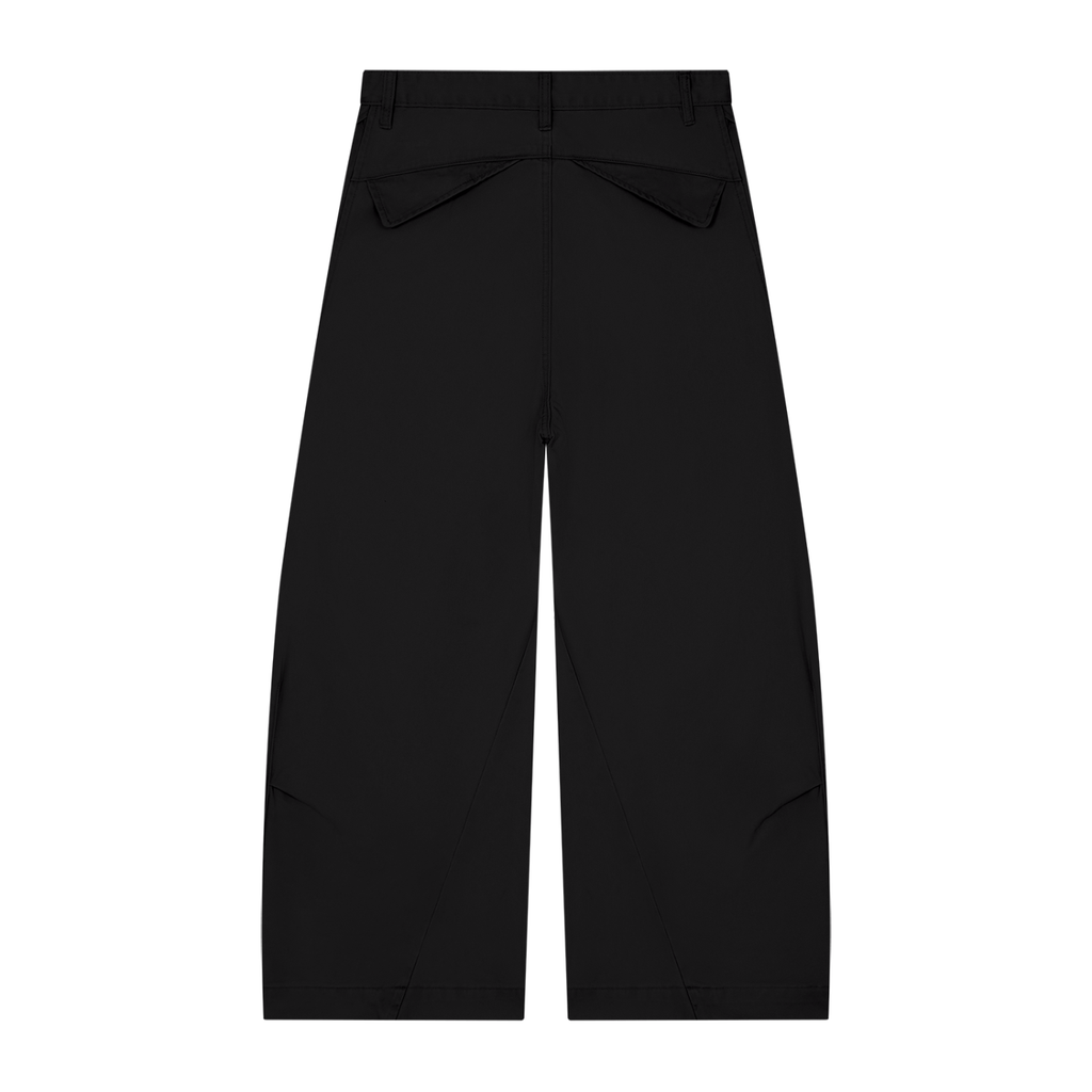 NO NOISE™ 001 Barrel Leg Pant in Black, back view with flap pockets and shaped leg seams