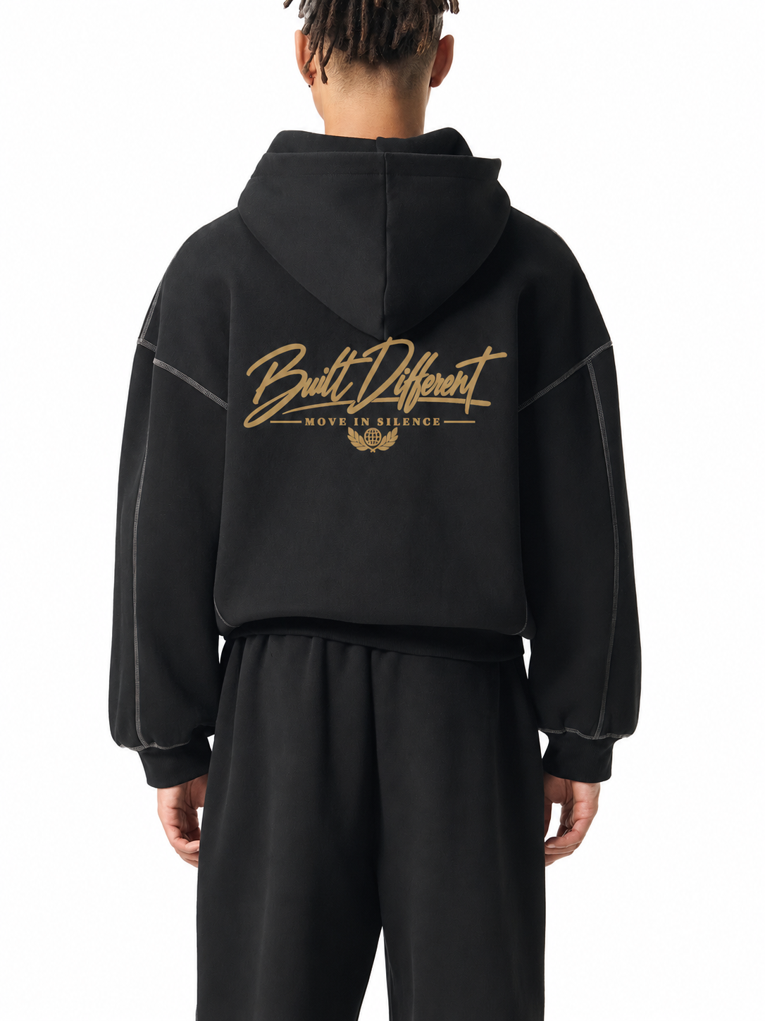 Rear model view of black Contrast-Stitched Boxy Zip Hoodie with antique-gold Built Different and Move in Silence artwork; digitally branded supplier photo