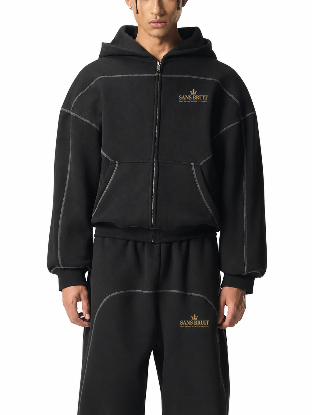 Front model view of the black Contrast-Stitched Boxy Zip Hoodie with gold Sans Bruit chest print; digitally branded supplier photo