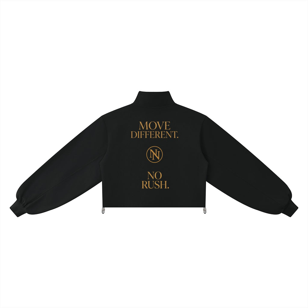 NO NOISE WORLD black mock-neck quarter-zip cropped sweatshirt with gold Move Different No Rush graphic on the back