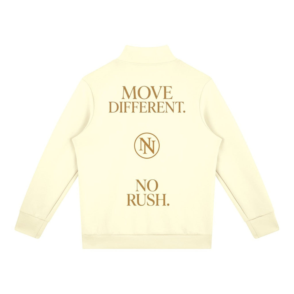 NO NOISE WORLD cream men's quarter zip with gold back print featuring Move Different and No Rush text.