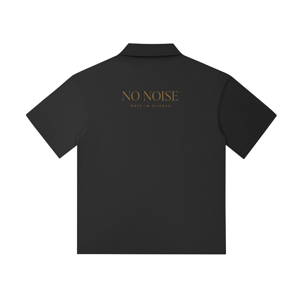 NO NOISE WORLD Signature Drop Shoulder Polo in shadow black with gold logo print on the back, short sleeve design.