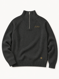 Sans Bruit Quarter-Zip Pullover — Charcoal — front flat lay on warm ivory.