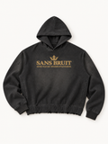 Sans Bruit Distressed Boxy Hoodie — Washed Black — front flat lay on warm ivory.