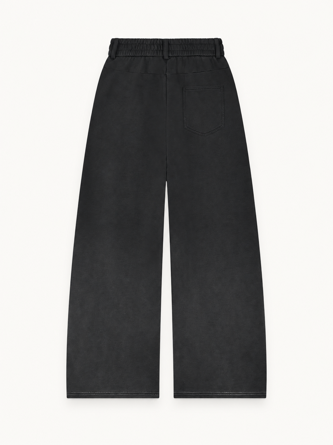Sans Bruit Paneled Barrel Pants — Washed Black — back flat lay on warm ivory.