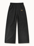 Sans Bruit Paneled Barrel Pants — Washed Black — front flat lay on warm ivory.